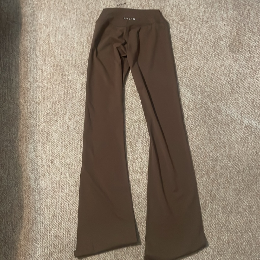 NVGTN - Espresso Effortless Flare Leggings. 
Size - M 
NEVER WORN. 
NWT.